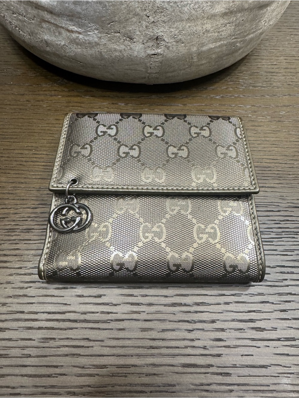 Gucci metallic beige gold GG compact wallet with dangling GG charm